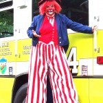 Blogger Marsha Gallagher shows another side of herself as she brings her clown character to life on stilts.